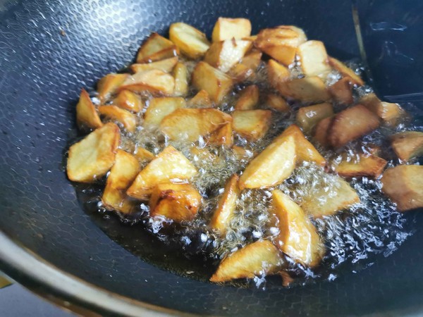 鍋巴土豆的做法-香辣味拌菜譜